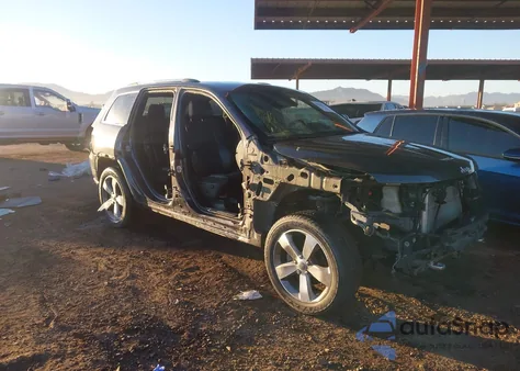 2014 Jeep Grand Cherokee Overland из США, поврежденный, VIN 1C4RJECG3EC396408